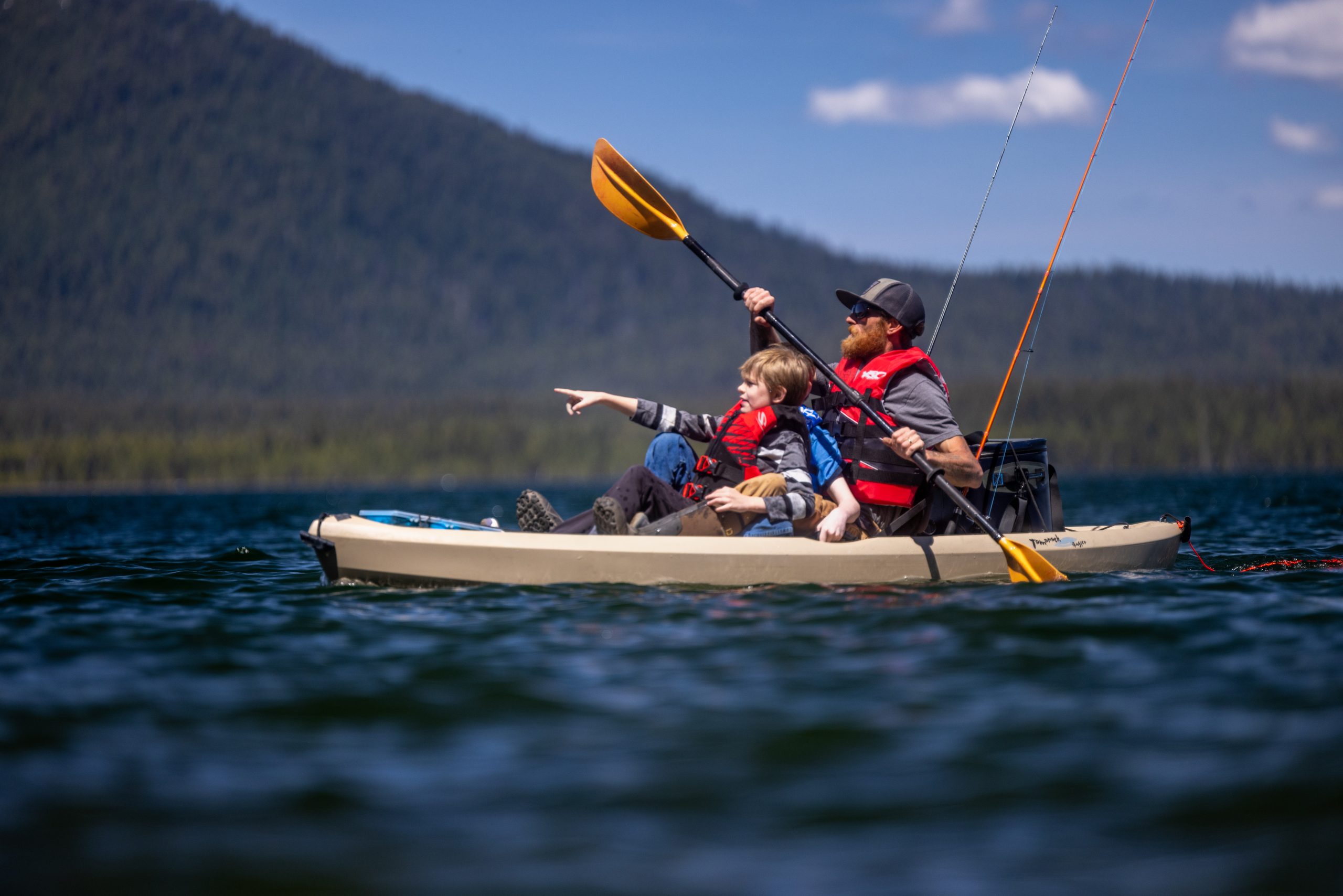 father and son kayaking