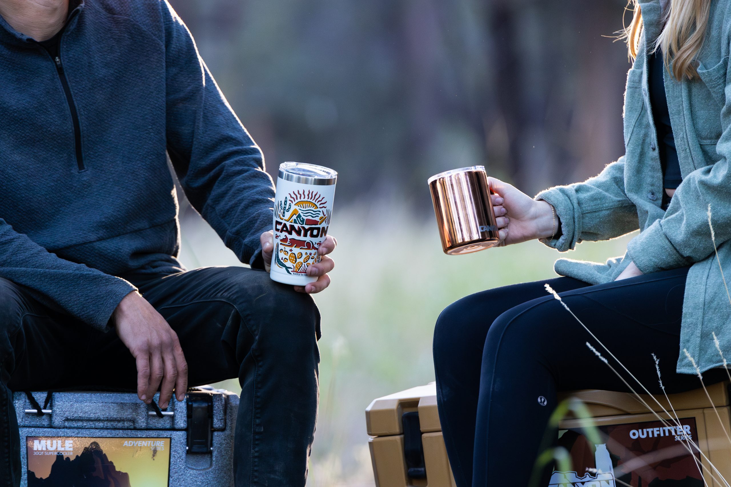 Couple with their canyon mugs